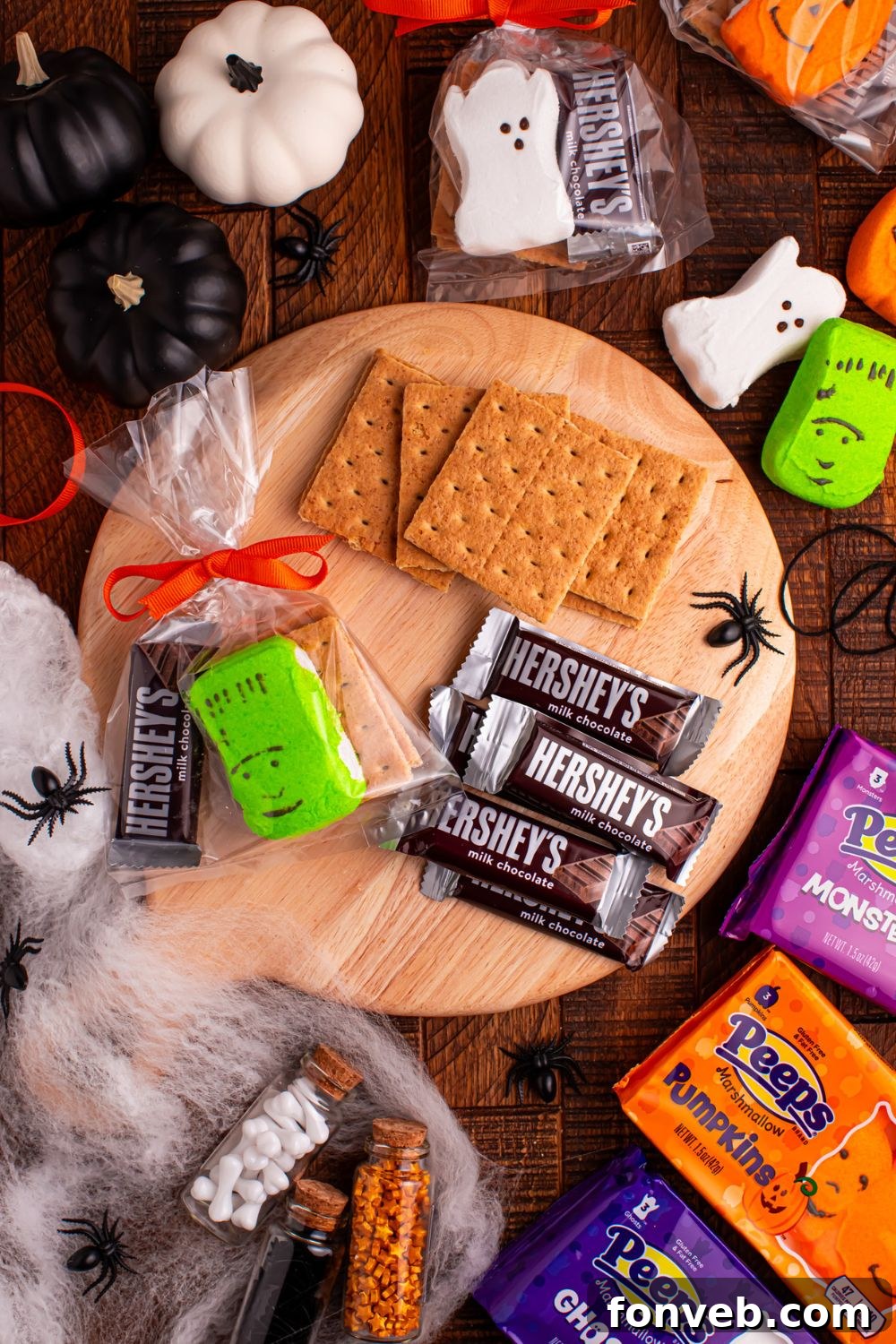 Spooky S'mores Kits 7 Halloween Smores Gift Bag on table with chocolate bars and graham crackers to the side