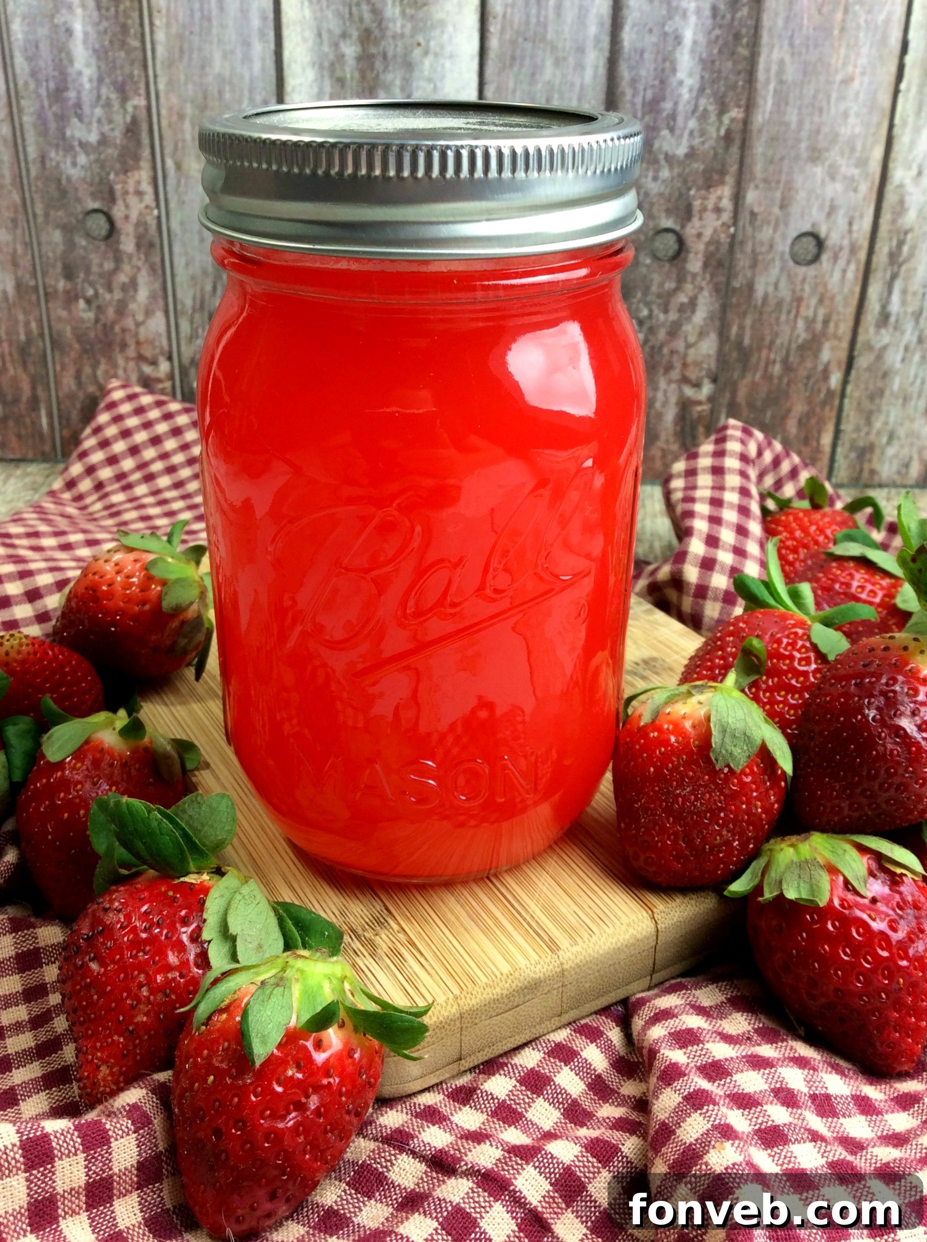 A collection of final strawberry moonshine jars, beautifully presented and ready to enjoy