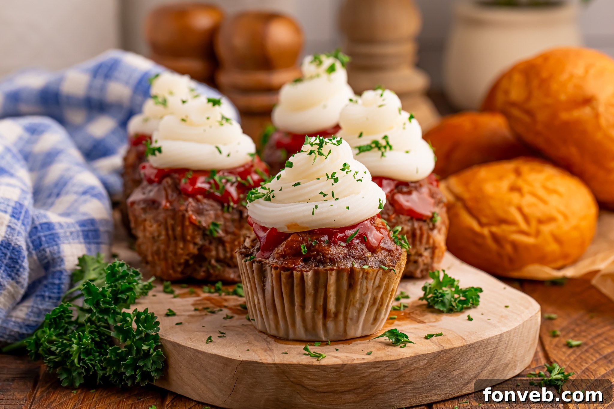 Meatloaf Cupcakes sitting on a tray to show the layers to the meat cupcake