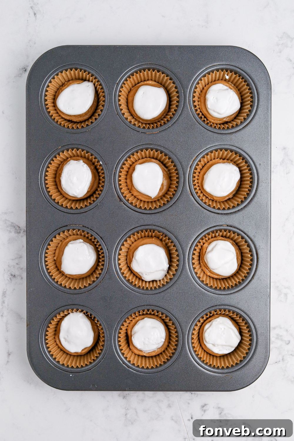 Peanut Butter Fluff Cups 8 marshmallow cream on top of peanut butter in muffin cups