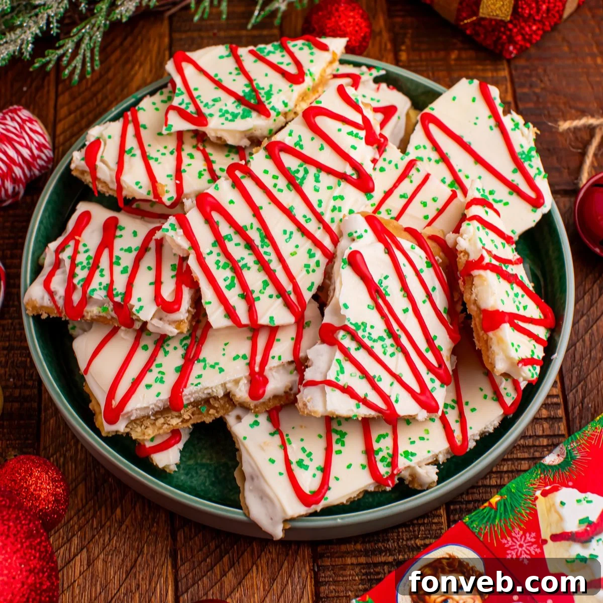 Addictive Little Debbie Christmas Tree Cake Toffee Bark 3 Christmas Tree Crack scattered and placed on plate on table