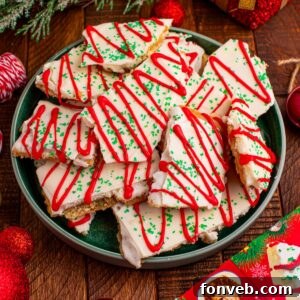 Addictive Little Debbie Christmas Tree Cake Toffee Bark 21 Christmas Tree Crack scattered and placed on plate on table