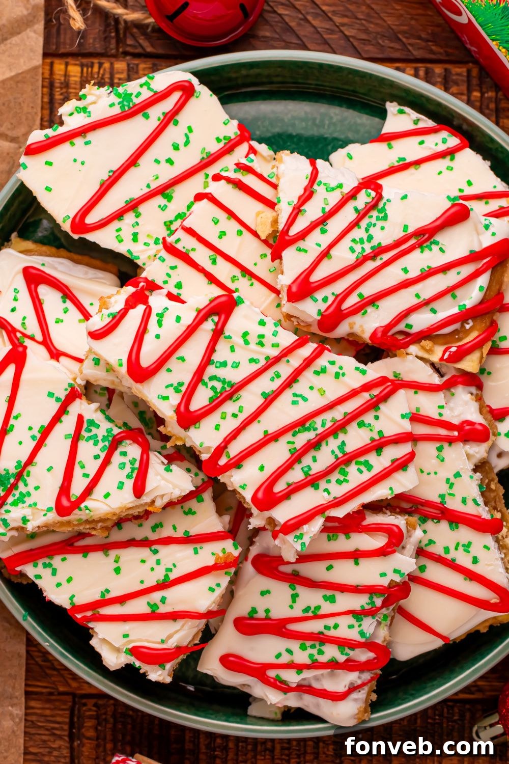 Addictive Little Debbie Christmas Tree Cake Toffee Bark 4 Christmas Tree Crack on a plate stacked on top of each other