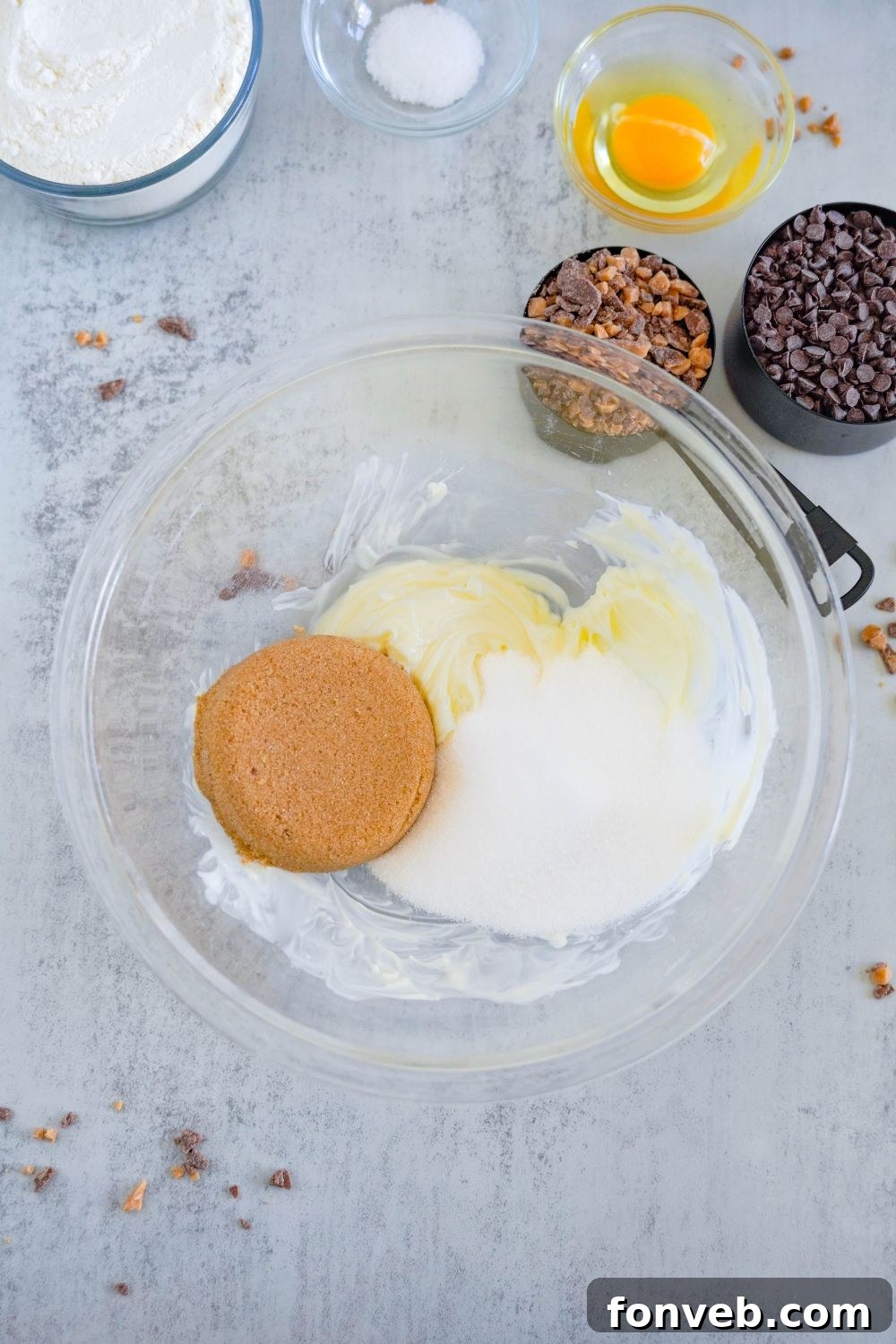 butter and sugar in a glass bowl on table 