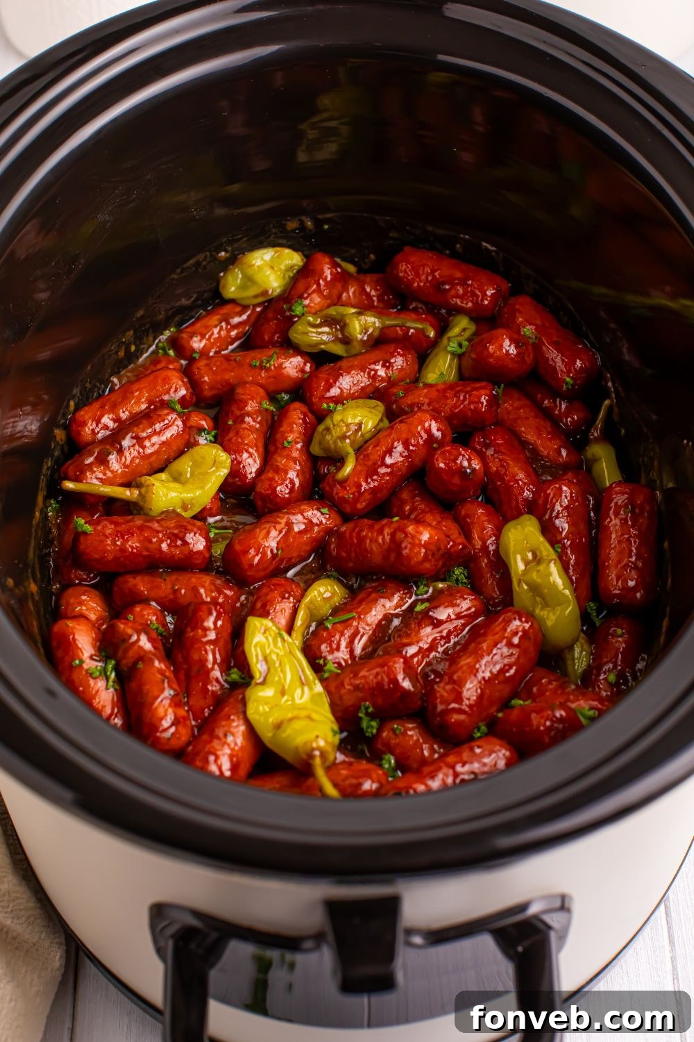 mississippi mini sausages in a slow cooker sitting on table