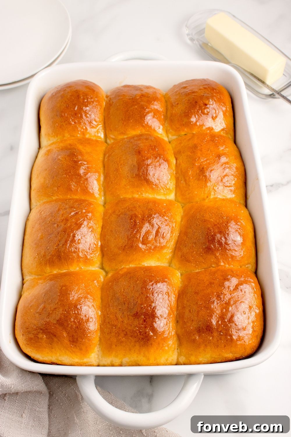 Pull Apart Dinner Rolls in a baking dish on the counter