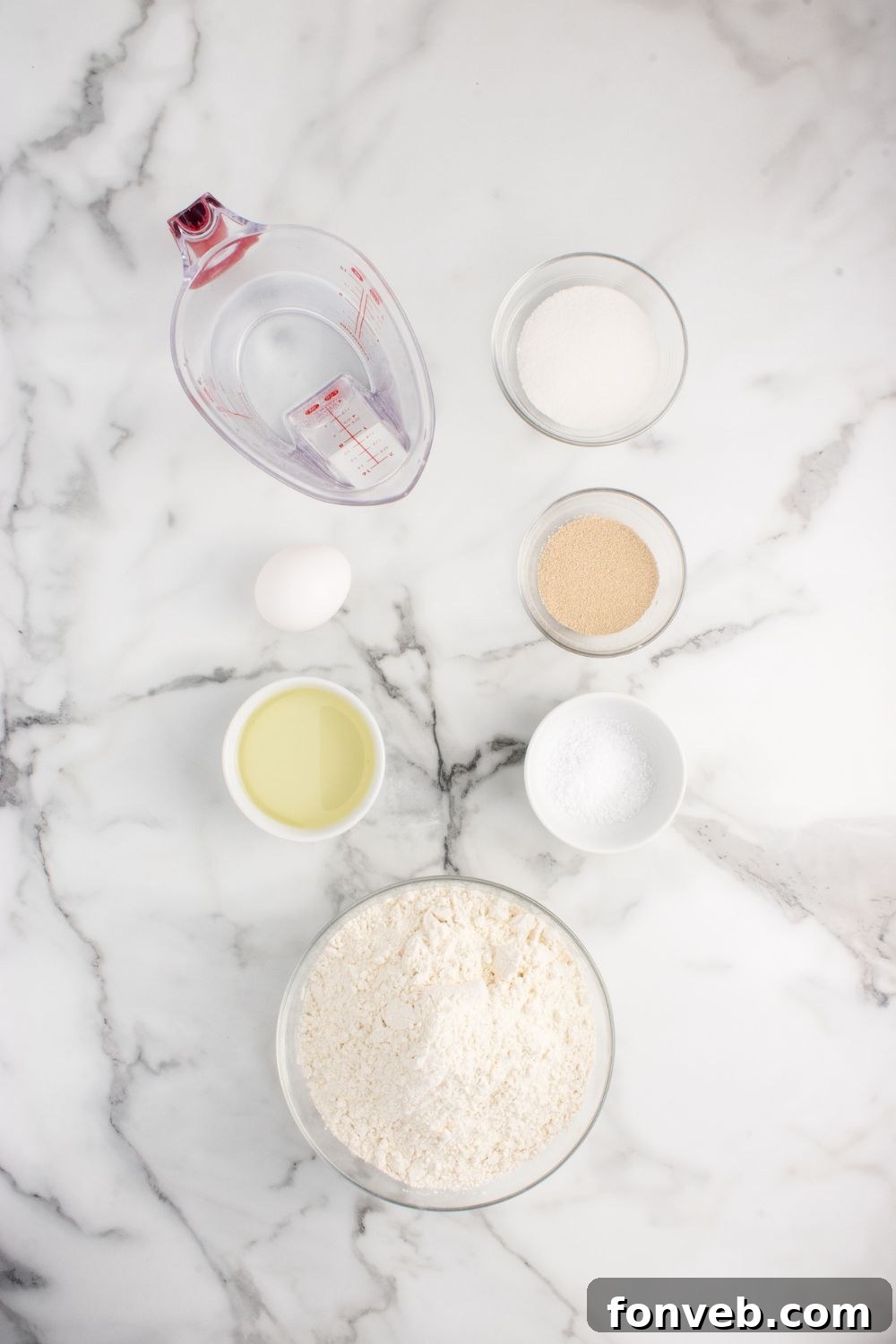 all the ingredients to make Pull Apart Dinner Rolls in single serve containers sitting on counter
