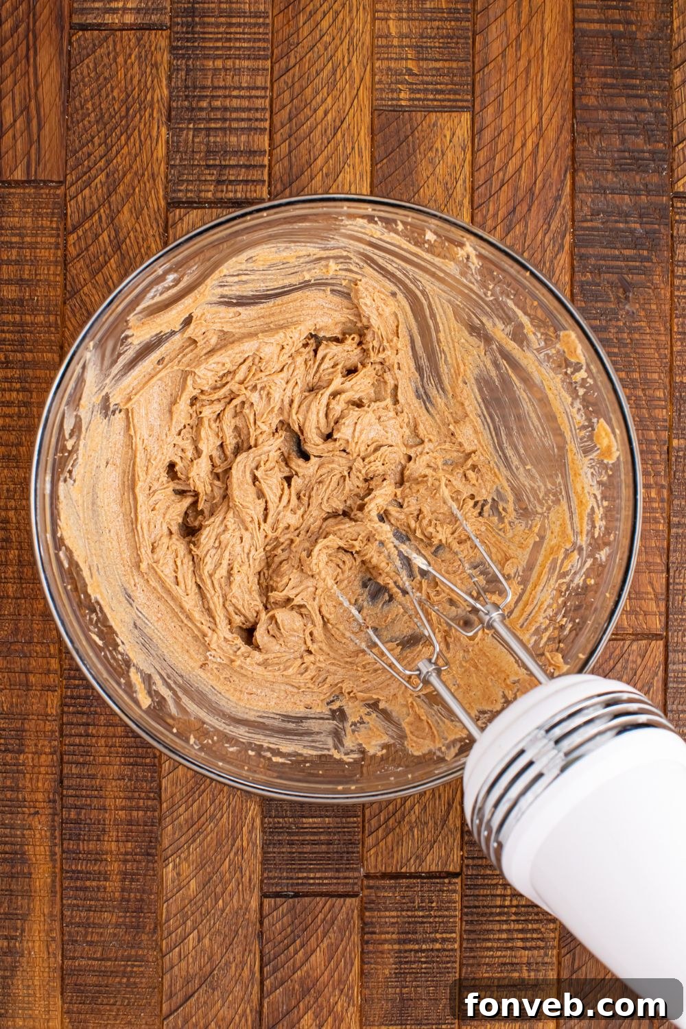 hand mixer whipping up the Brown Sugar Cinnamon Butter in bowl 