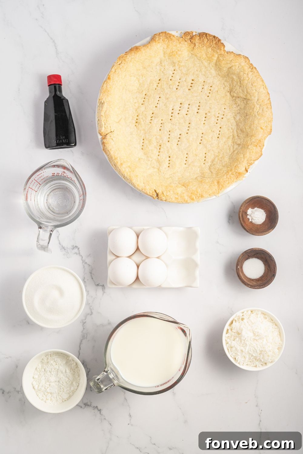ingredients for Coconut Meringue Pie in single serve containers on table