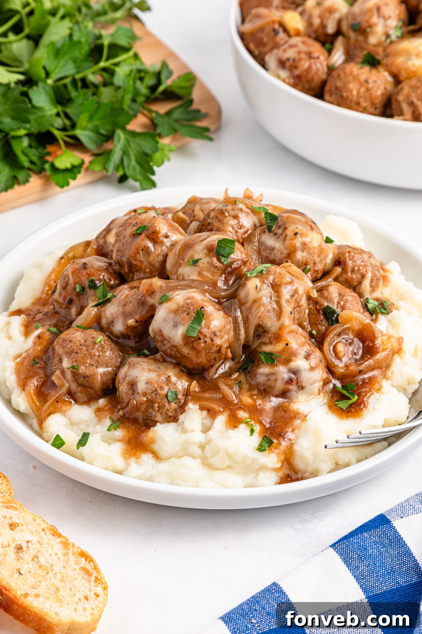 Crock Pot French Onion Meatballs in a white dish