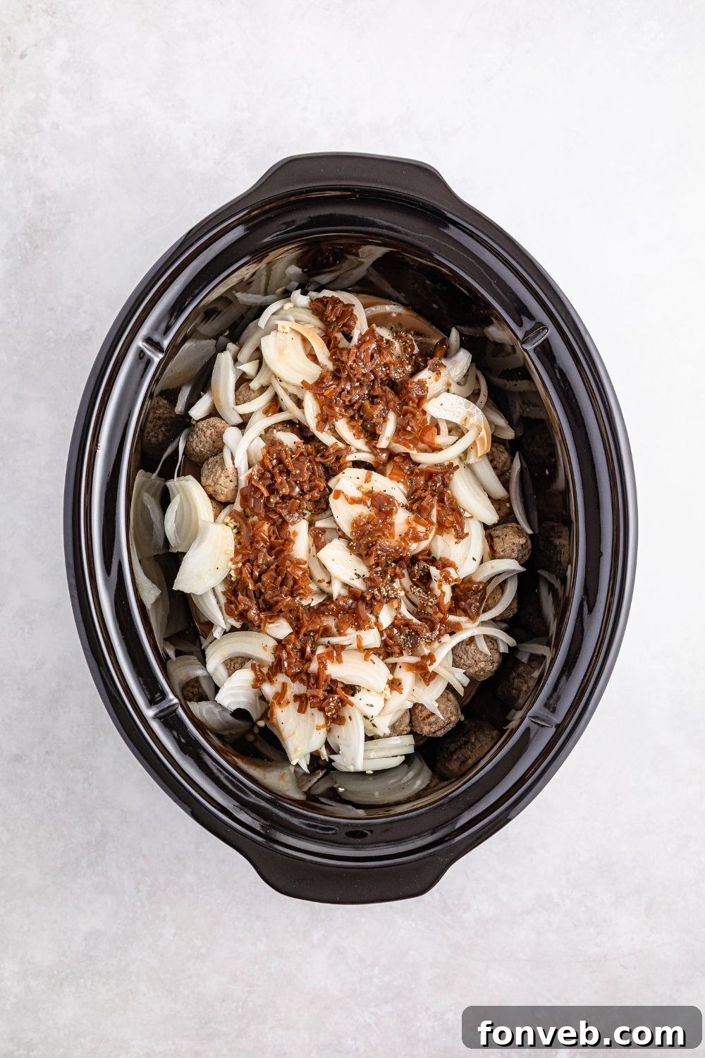 Crock Pot French Onion Meatballs ingredients in a crock pot 