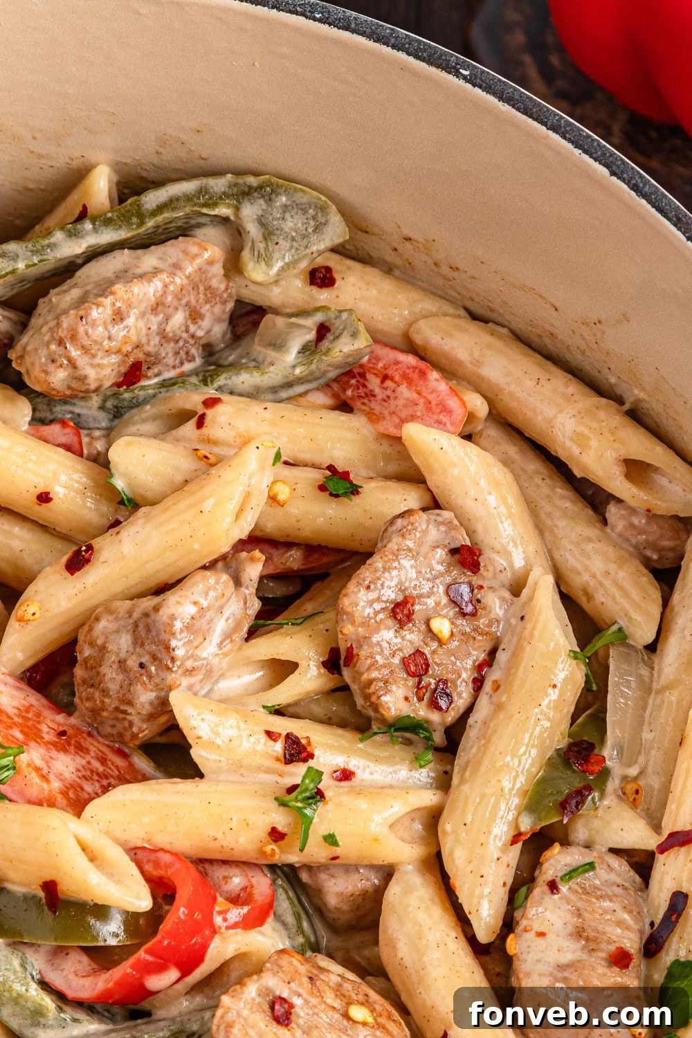Reggae Ragu 22 close up of creamy Rasta Pasta in a pot on table