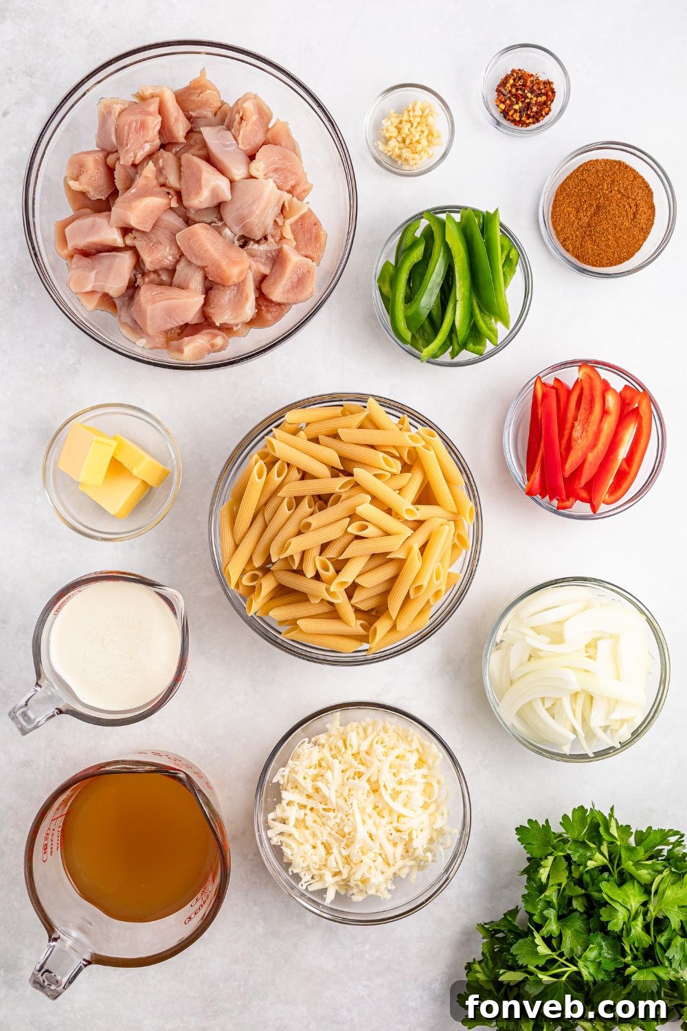 Reggae Ragu 10 ingredients for Rasta Pasta in single serve bowls on white counter