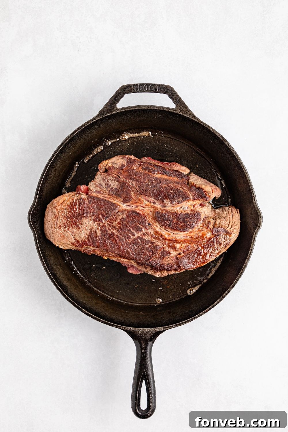 Hearty Mississippi Melt Quesadillas 10 pot roast being seared in a skillet