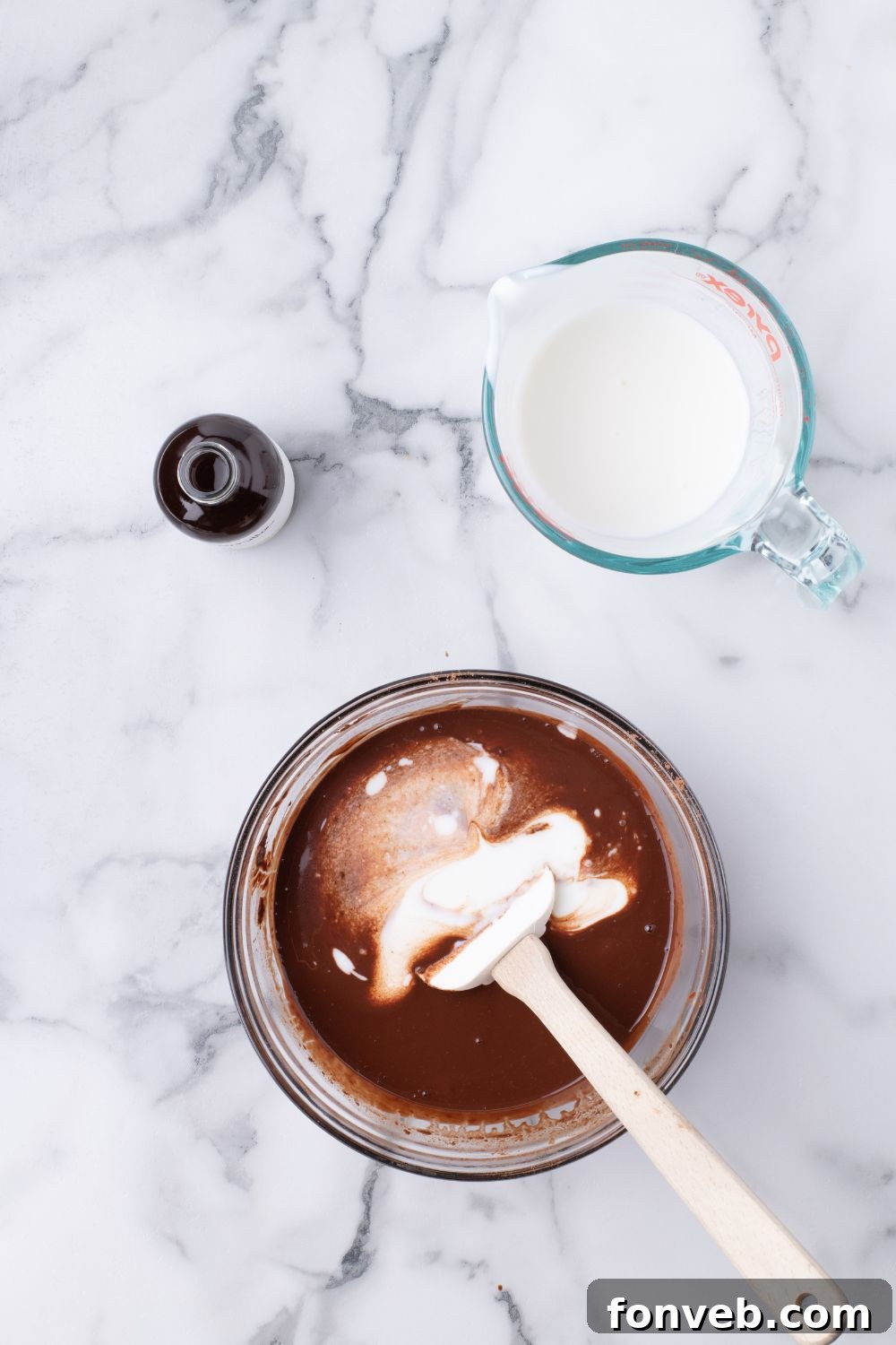 Decadent Chocolate Cream Dream 15 A bowl filled with luscious cake batter for the Ding Dong Cake, resting on a table, showcasing its rich texture before baking.
