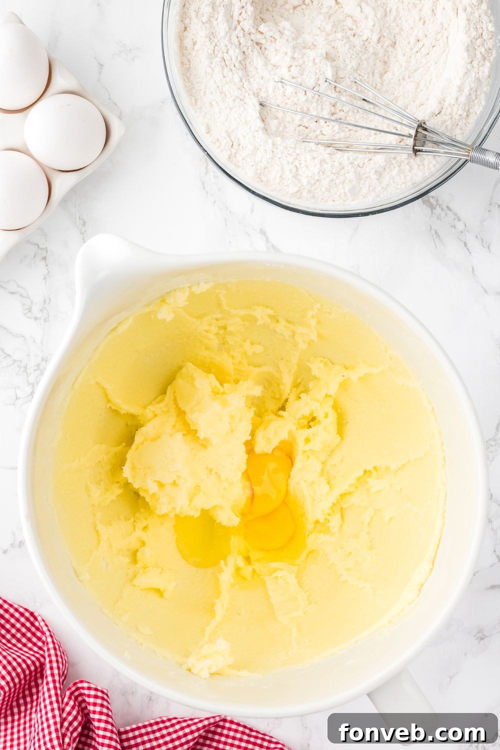 butter creamed together in bowl sitting on a table