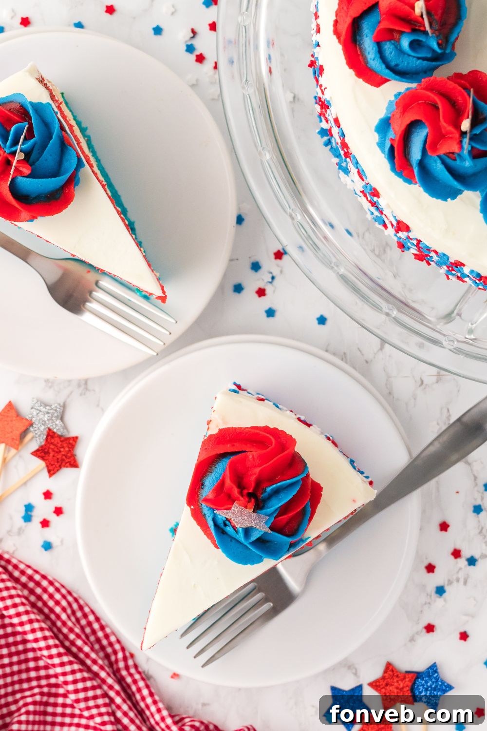 American Flag Cake with slices of cake on plates with forks by them 