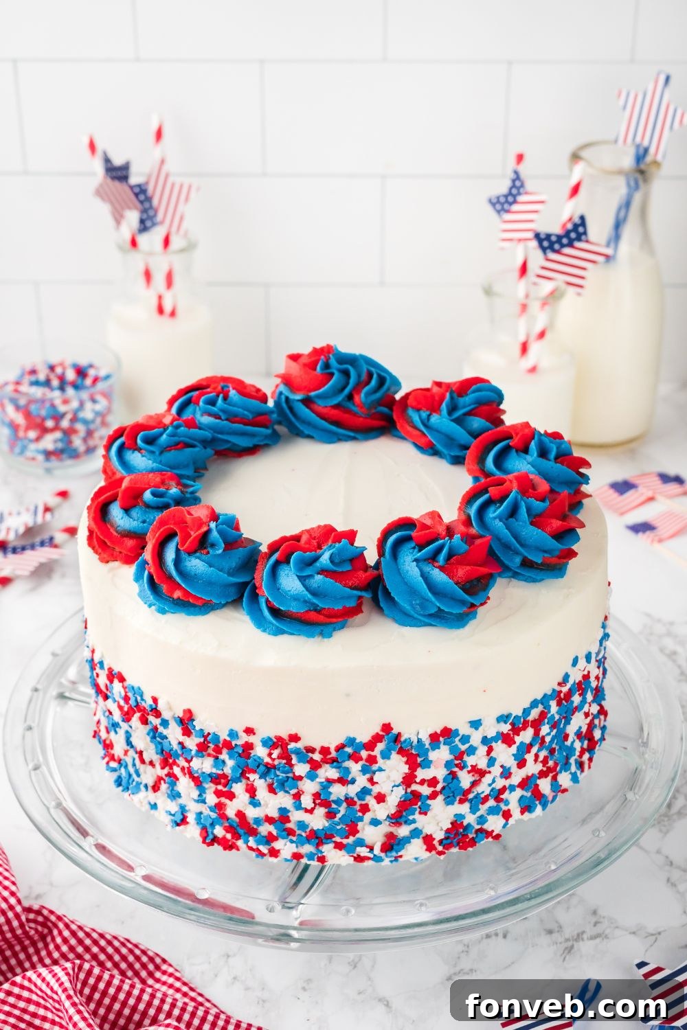 american flag cake on a pie plate on table 