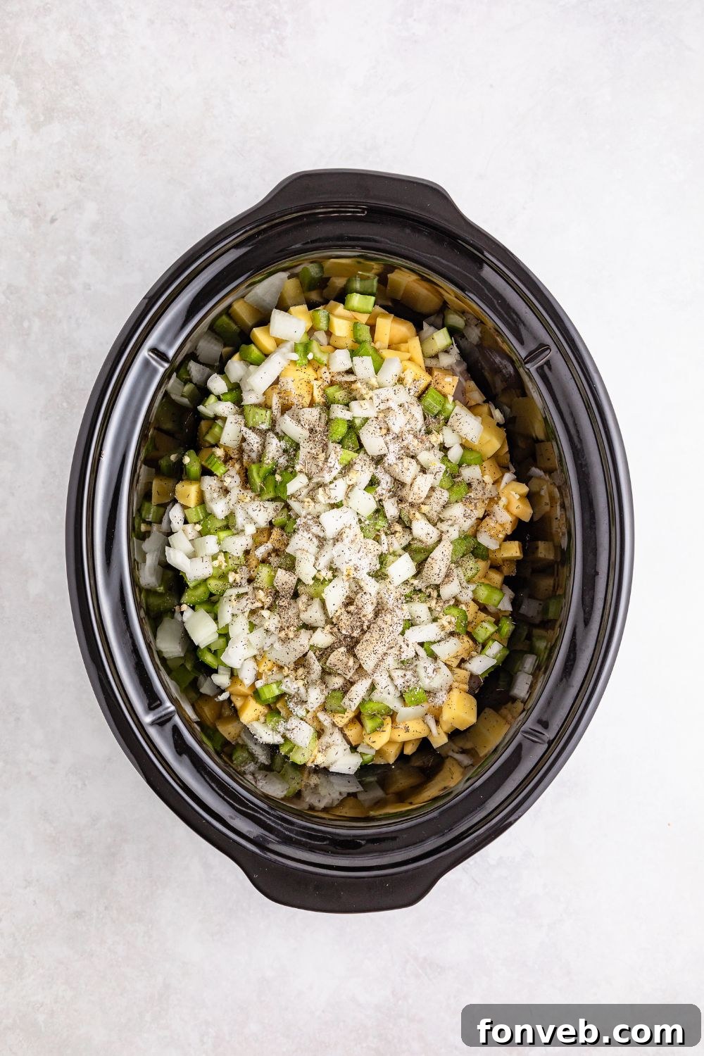 Easy Slow Cooker Chicken Pot Pie 10 ingredients for pot pie in slow cooker on table