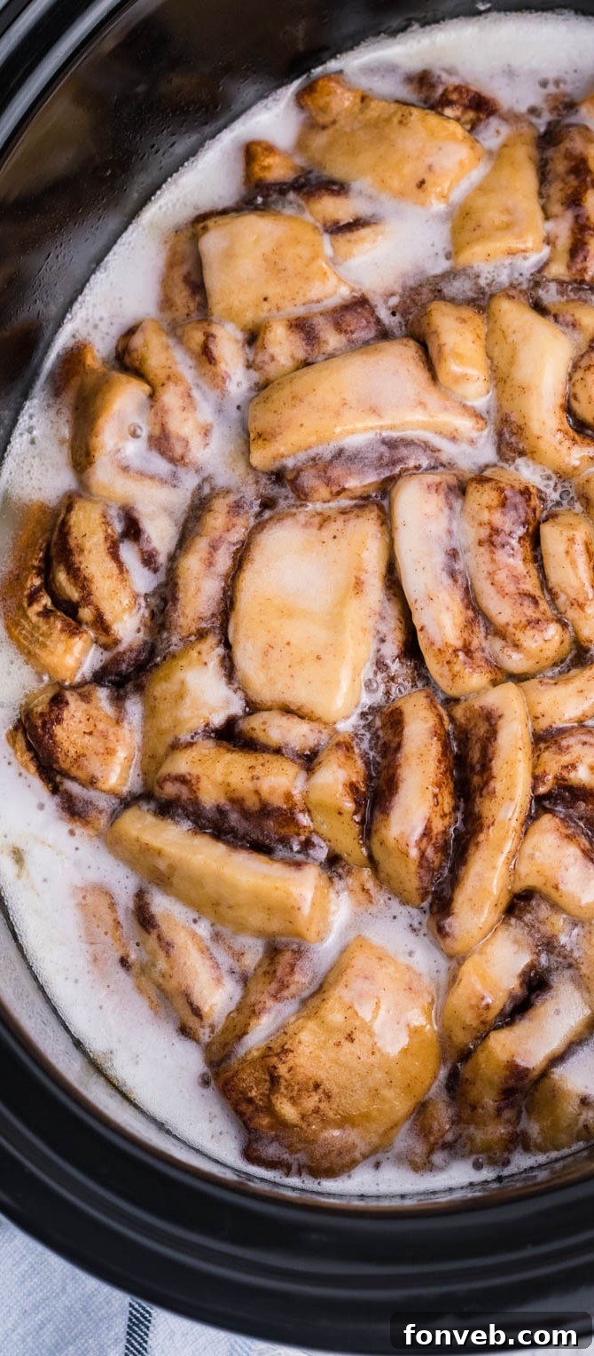 Cinnamon Roll Casserole up close covered in icing 