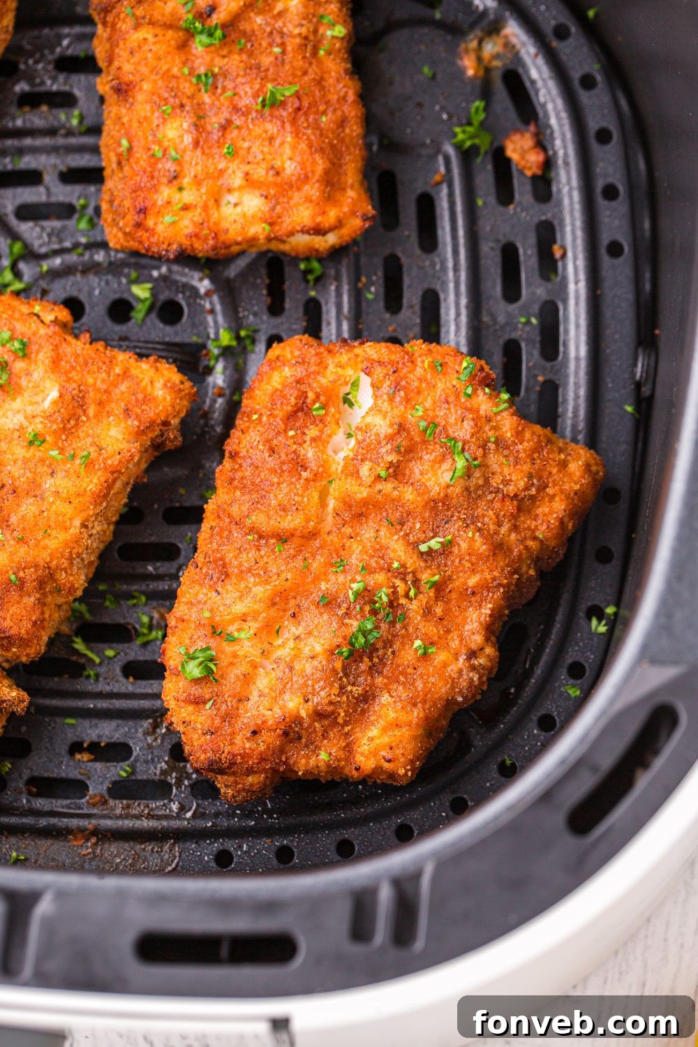 Crispy Air-Fried Fish and Chips 13 Air Fryer Fish in air fryer basket