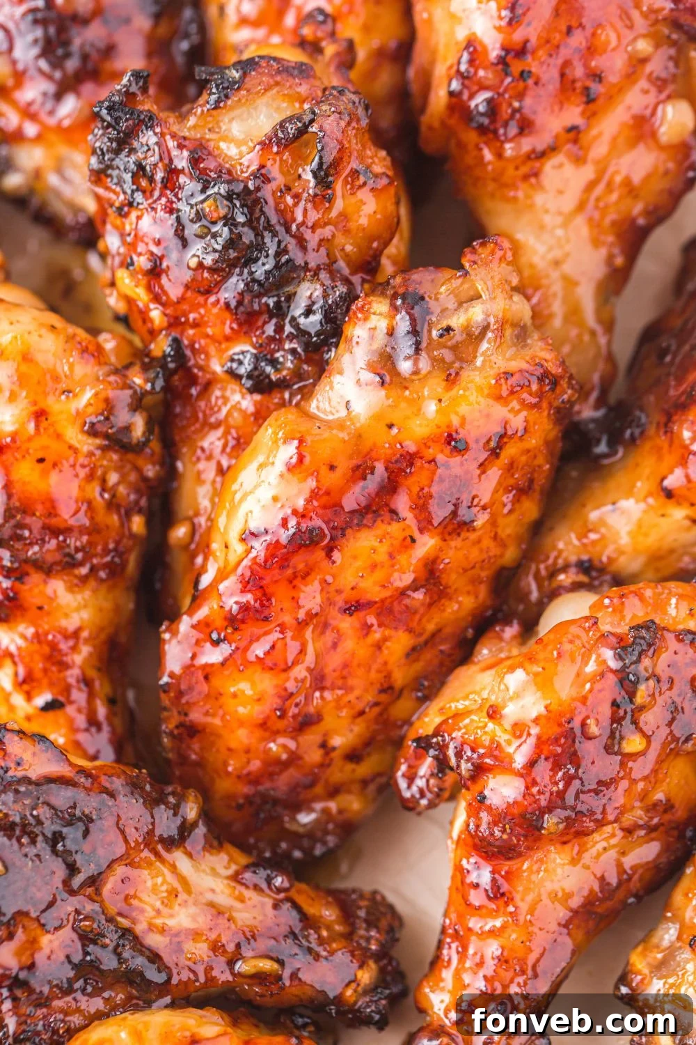 close up view of charred Air Fryer Honey Chicken Wings 