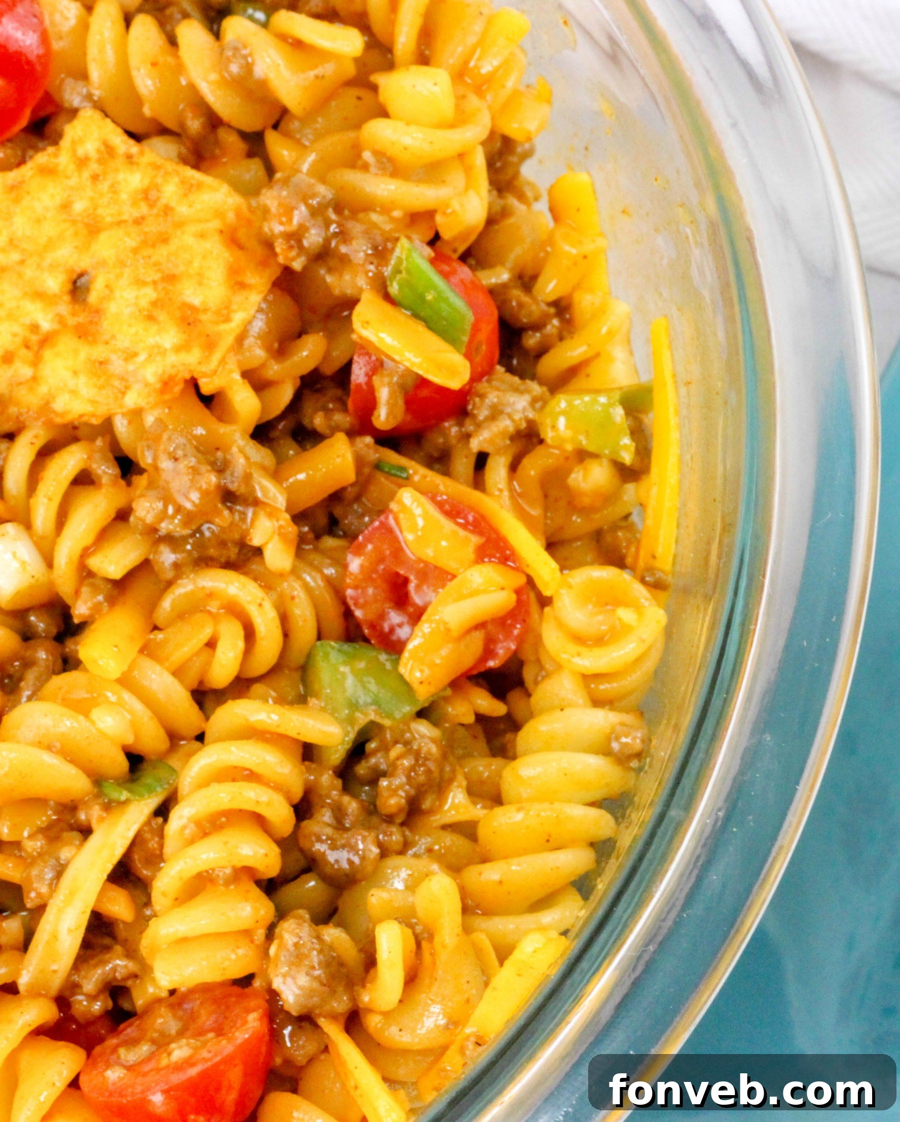 A single serving of Doritos Taco Pasta Salad in a smaller bowl, ready to eat.