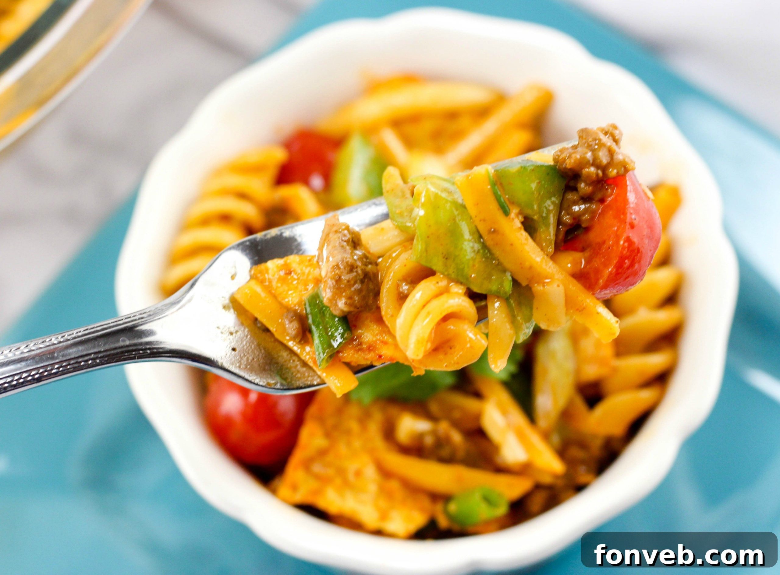 Ingredients for Doritos Taco Pasta Salad laid out on a table before preparation.