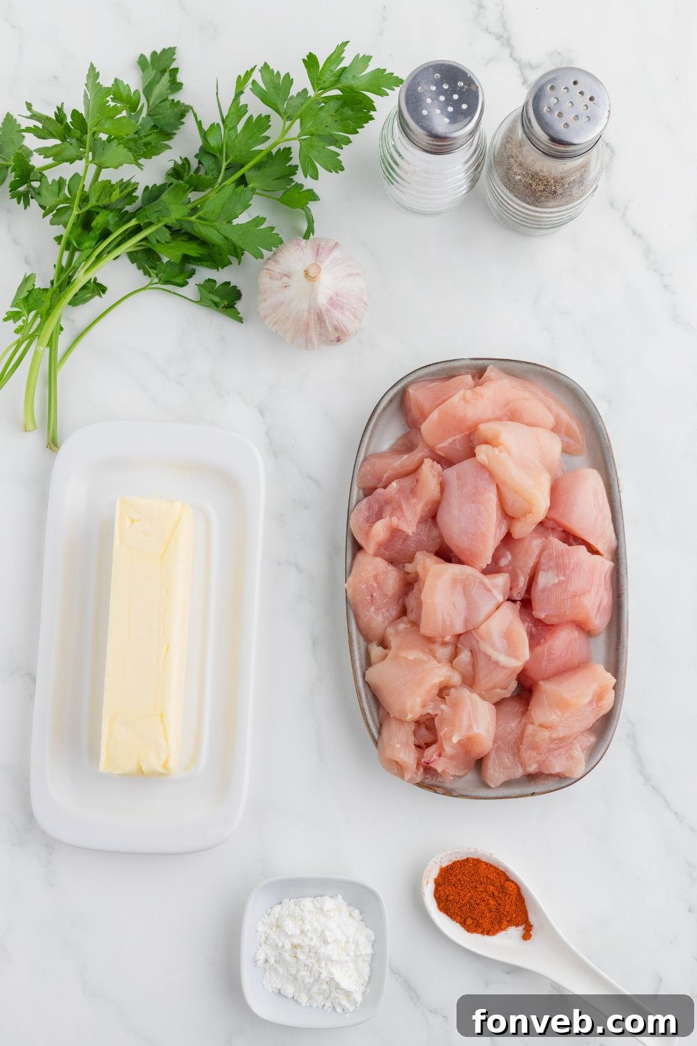 ingredients for Garlic Butter Chicken Bites on table in single serve containers