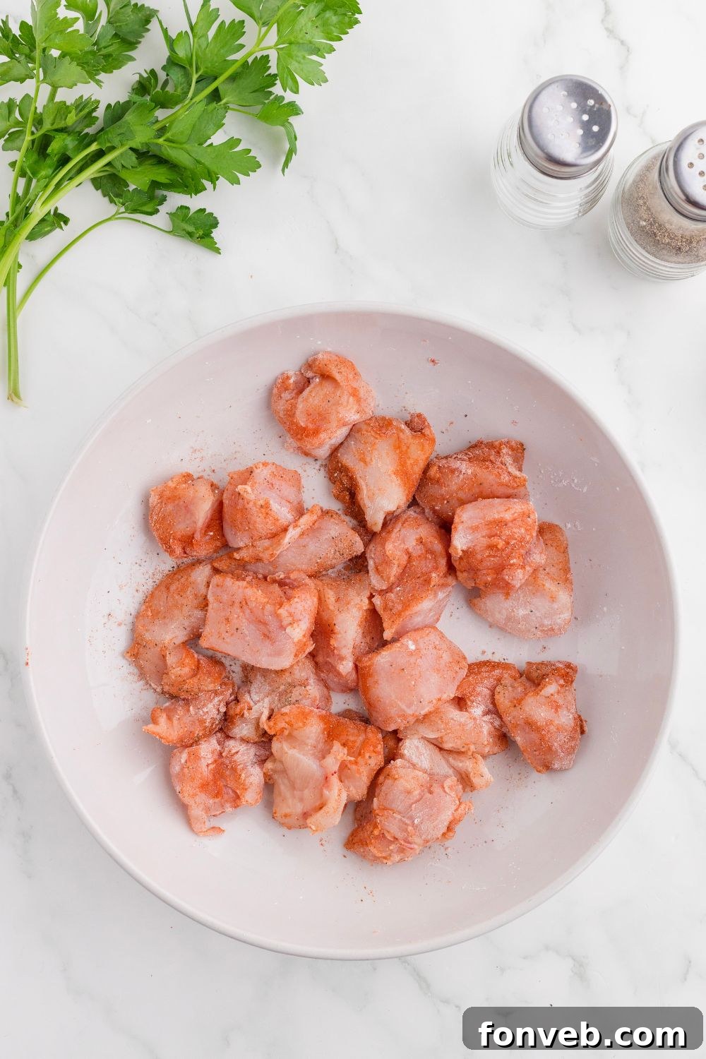 diced chicken in skillet