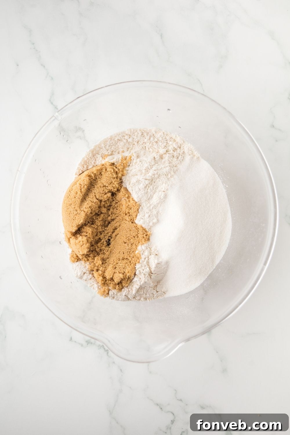 dry ingredients in glass bowl for Blueberry Crumb Bars
