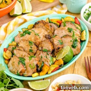 Grilled Pork Tenderloin sliced into mandolins and placed in a serving tray