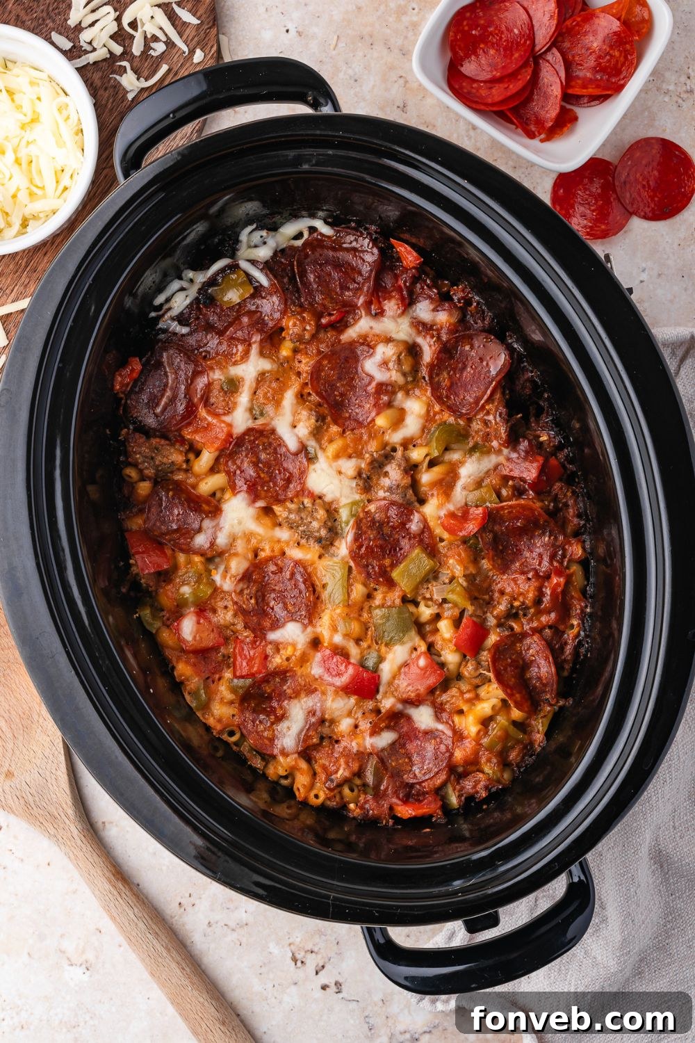overhead look of slow cooker with Slow Cooker Pizza Casserole in it