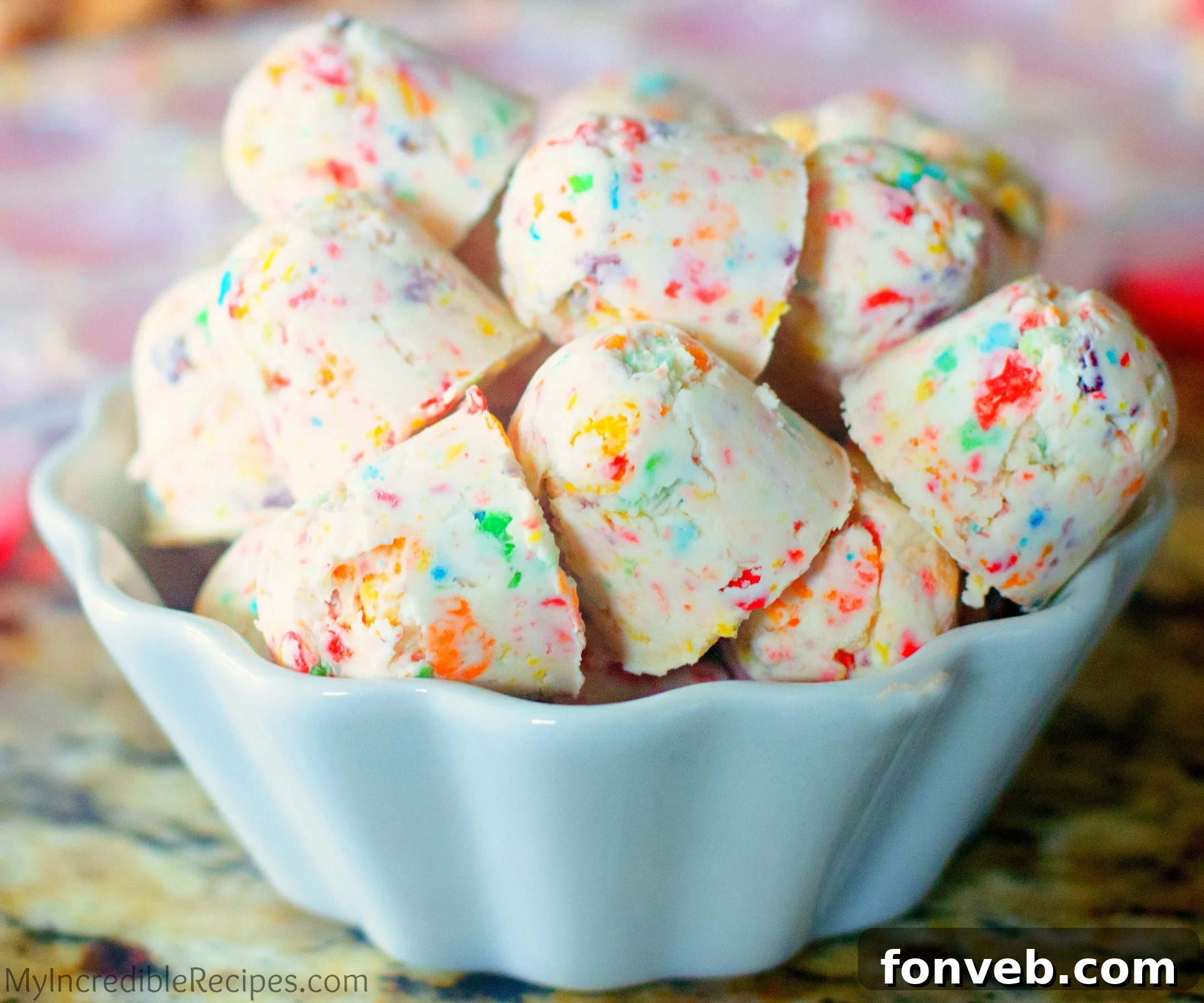 Colorful Fruity Pebbles Cheesecake Bites arranged beautifully, perfect for a summer treat.
