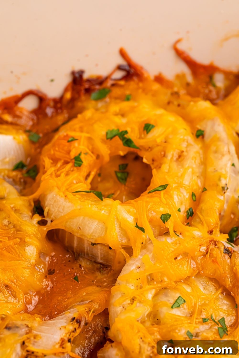 Cheesy Tennessee Onions baked up till golden brown in pan 