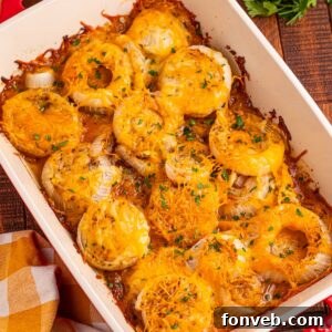Cheesy Tennessee Onions on a casserole pan on wooden table