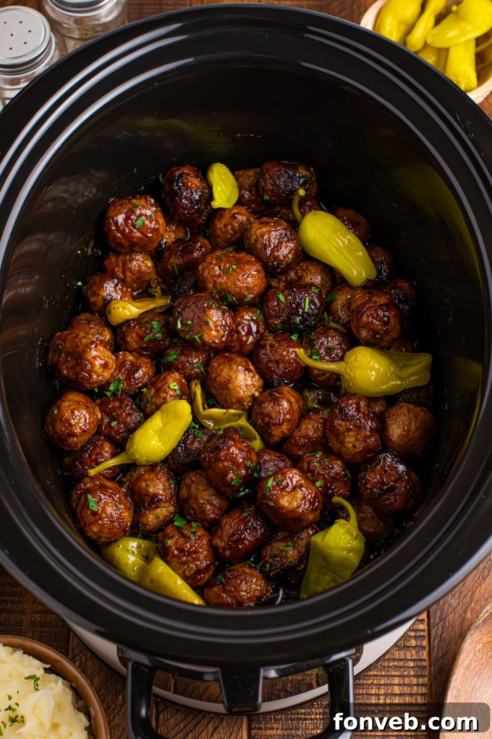 overhead look at the table with a Crockpot with Mississippi Meatballs in it 