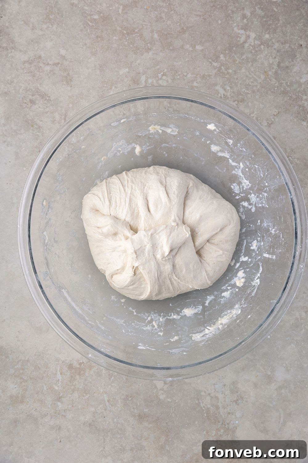 Effortless Homemade Sourdough Perfectly Crusty Always 11 small dough ball for Homemade Sourdough Bread in a bowl on table