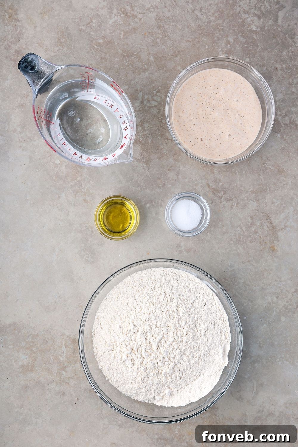 Effortless Homemade Sourdough Perfectly Crusty Always 7 ingredients for Homemade Sourdough Bread in single serve bowls on counter