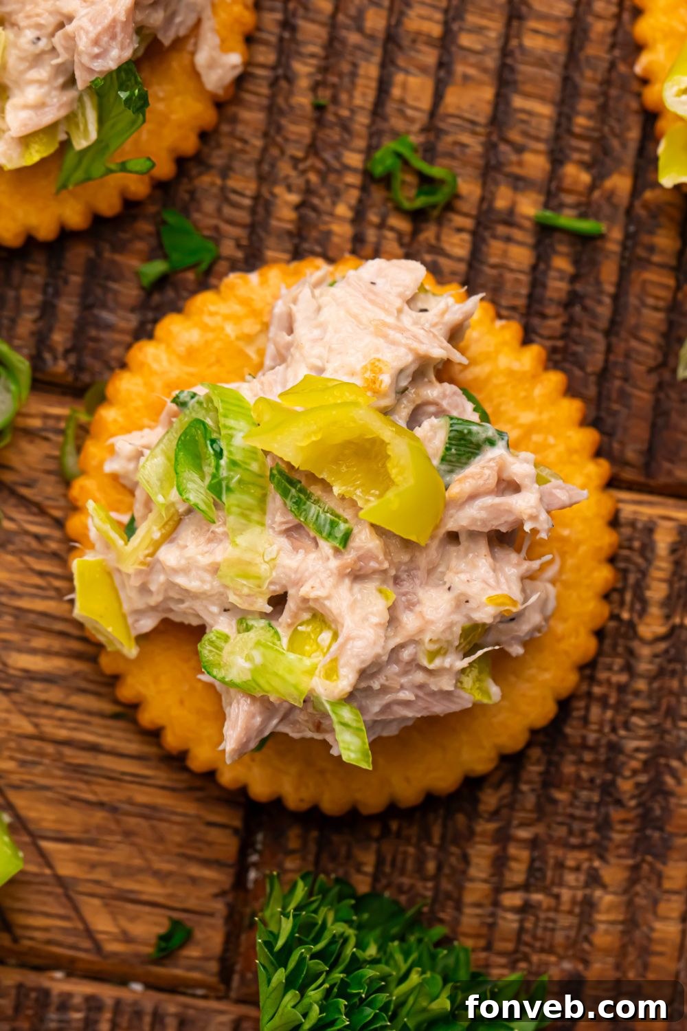 Pepperoncini Ranch Tuna Salad on top of a Ritz cracker sitting on table 