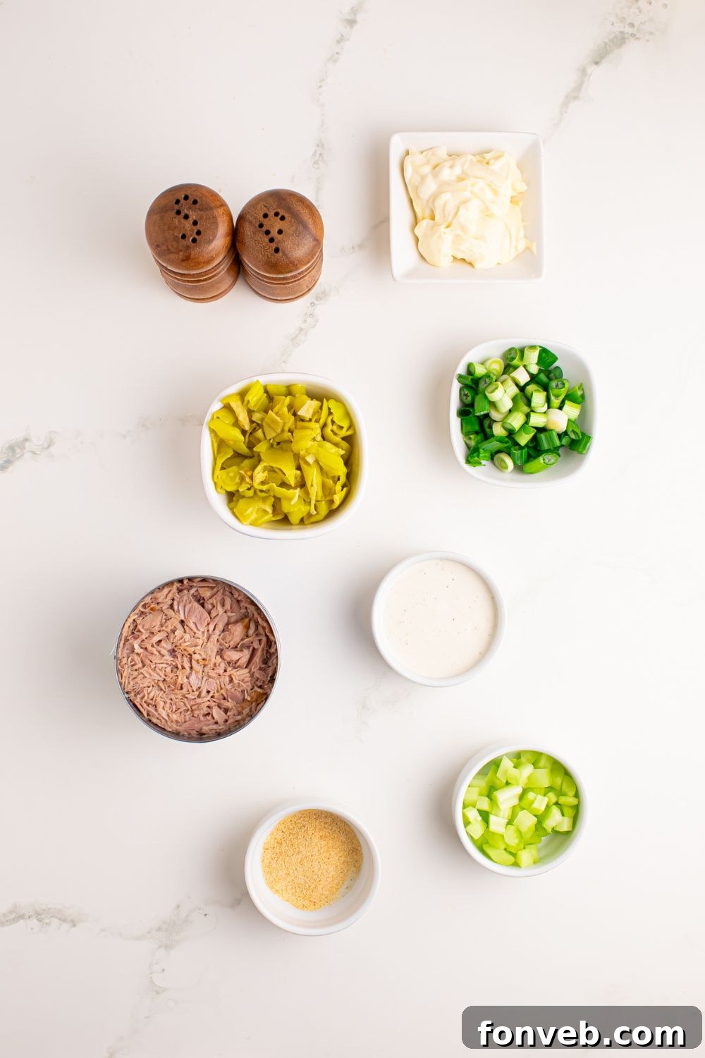 Pepperoncini Ranch Tuna Salad in small bowls sitting on a white table 