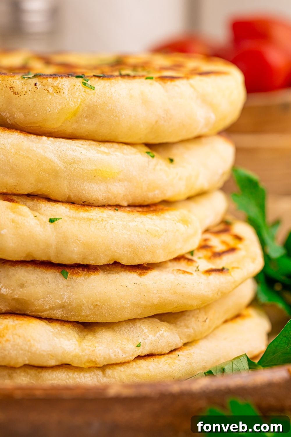 A close-up stack of 3-Ingredient Flatbreads, emphasizing their thickness and fluffy consistency