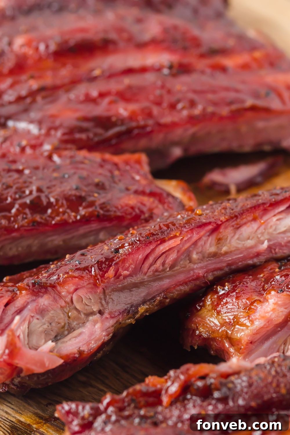 Grilled BBQ Baby Back Ribs cut into strips and placed on tables