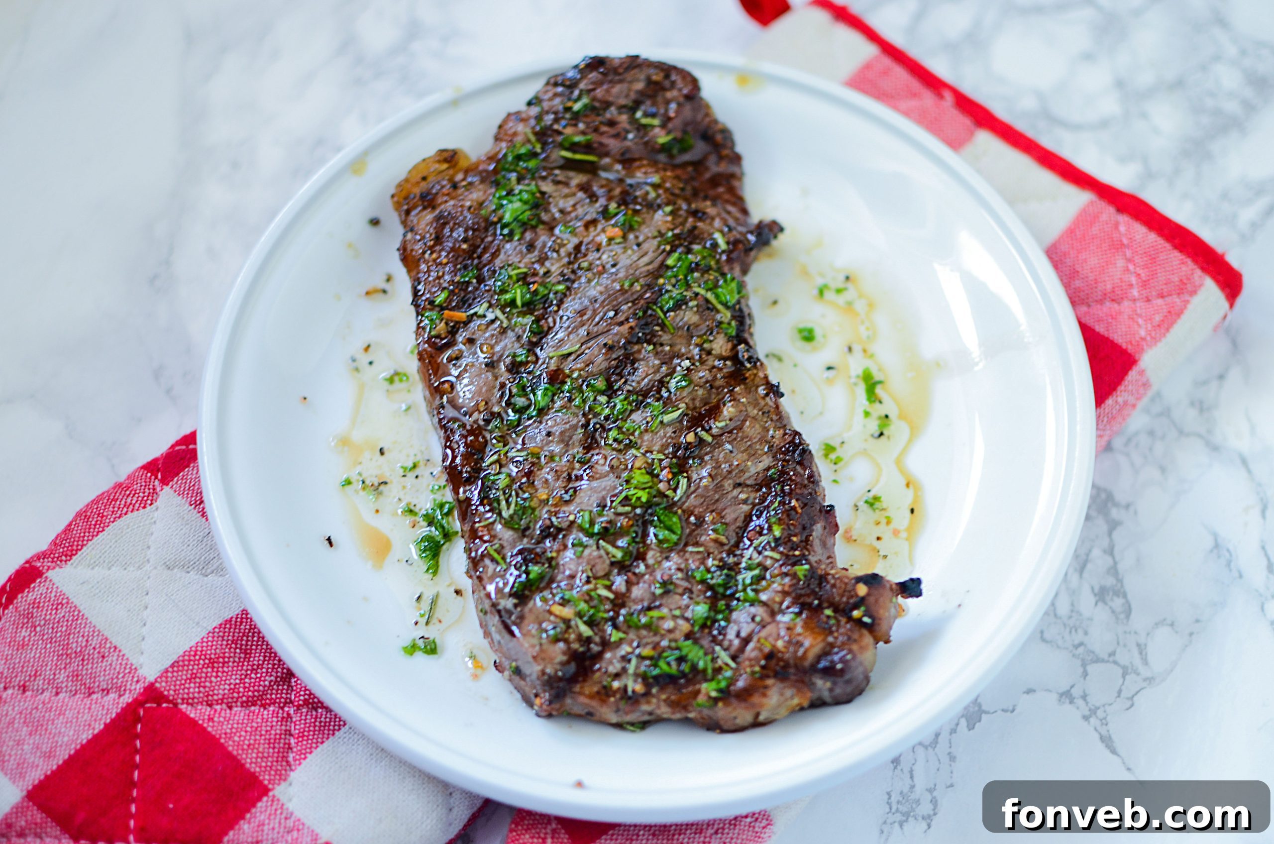 Grilling steaks on a hot grill, with a chef brushing a glaze onto the meat for extra flavor and shine.