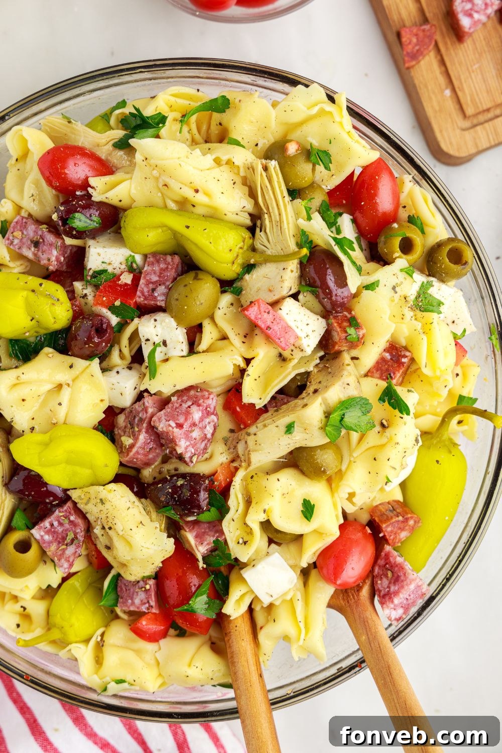 Antipasto Tortellini Pasta Salad in a bowl that is fully mixed up 