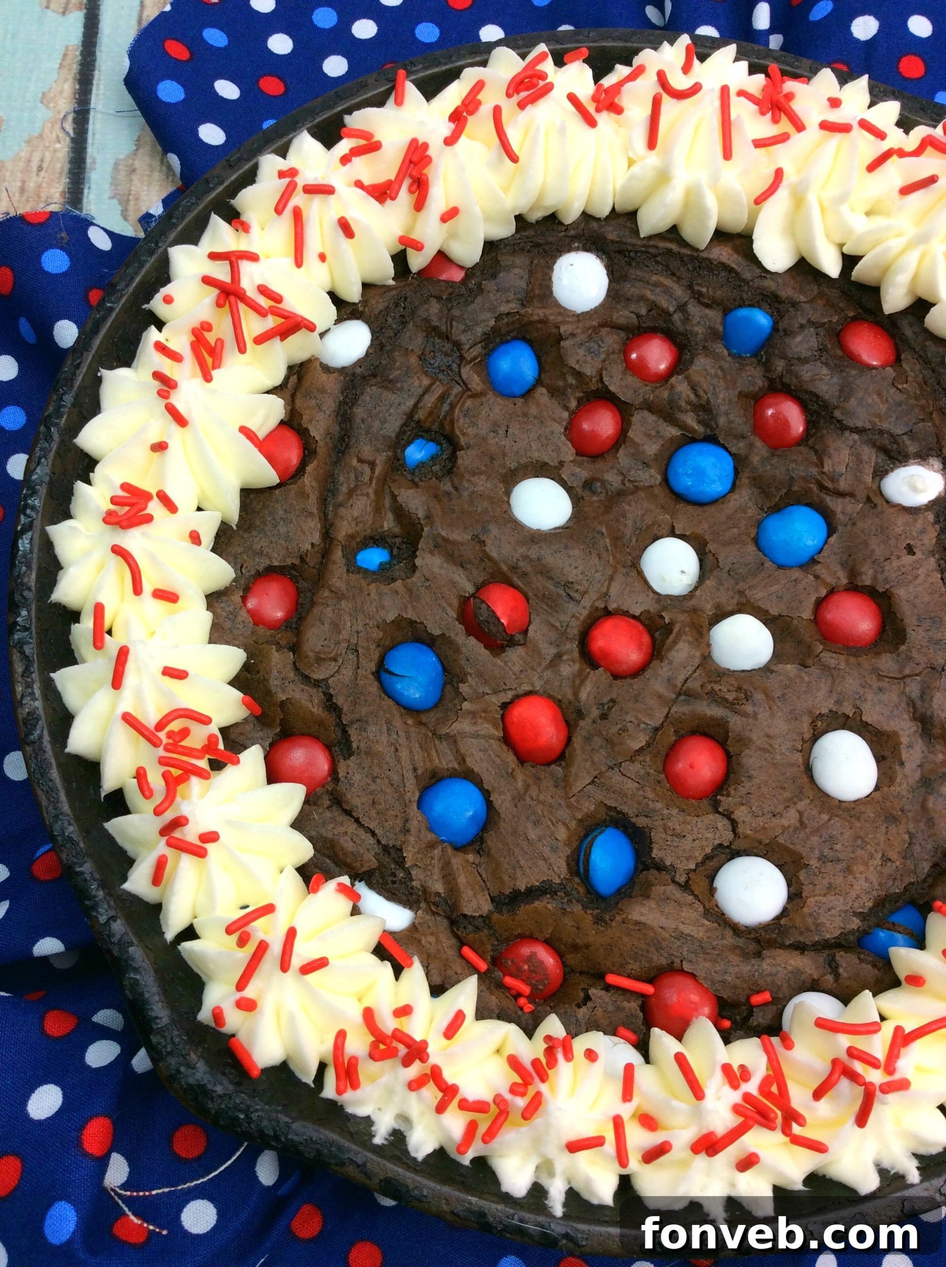 Gooey Skillet Fudge Brownie Perfection 2 A delectable Cast Iron Fudge Brownie Skillet, brimming with melted chocolate chips and a rich, fudgy texture.