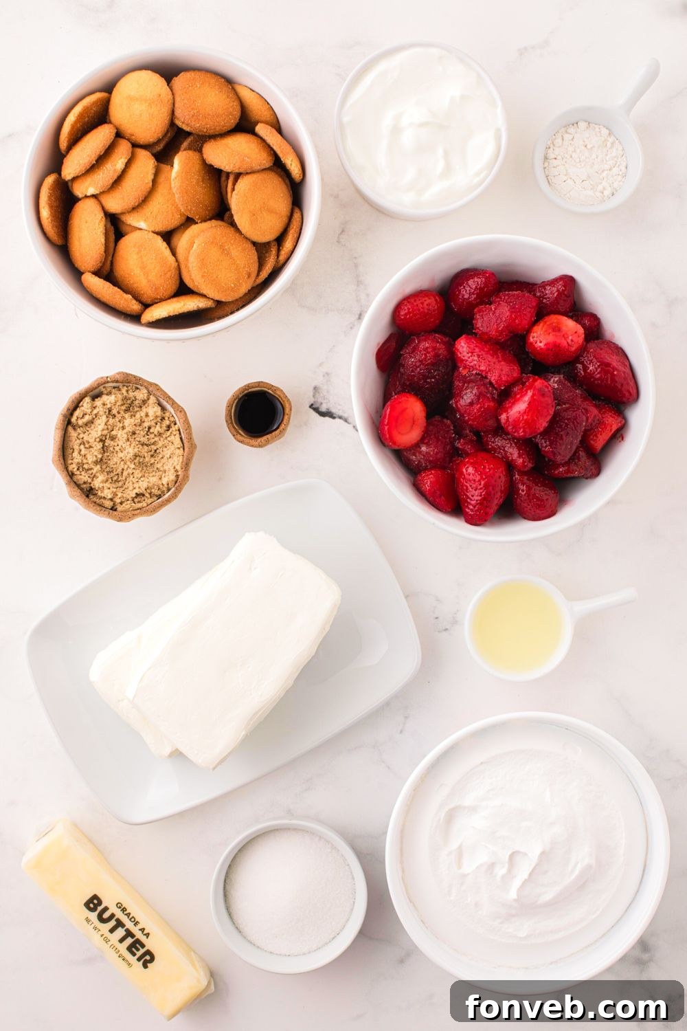 No Bake Strawberry Cheesecake ingredients in single serve bowls on table 