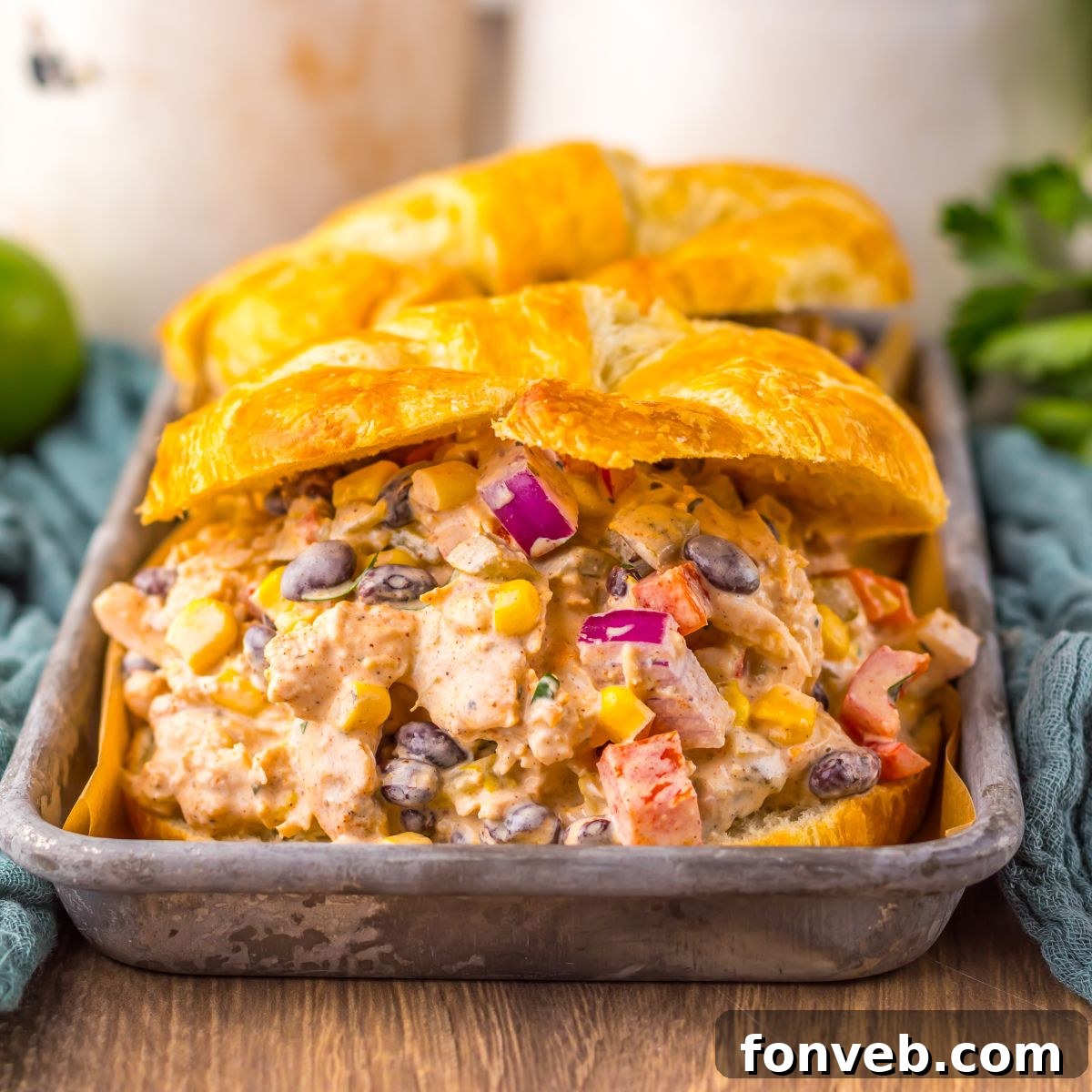 Creamy Taco Chicken Salad on a plate in croissants