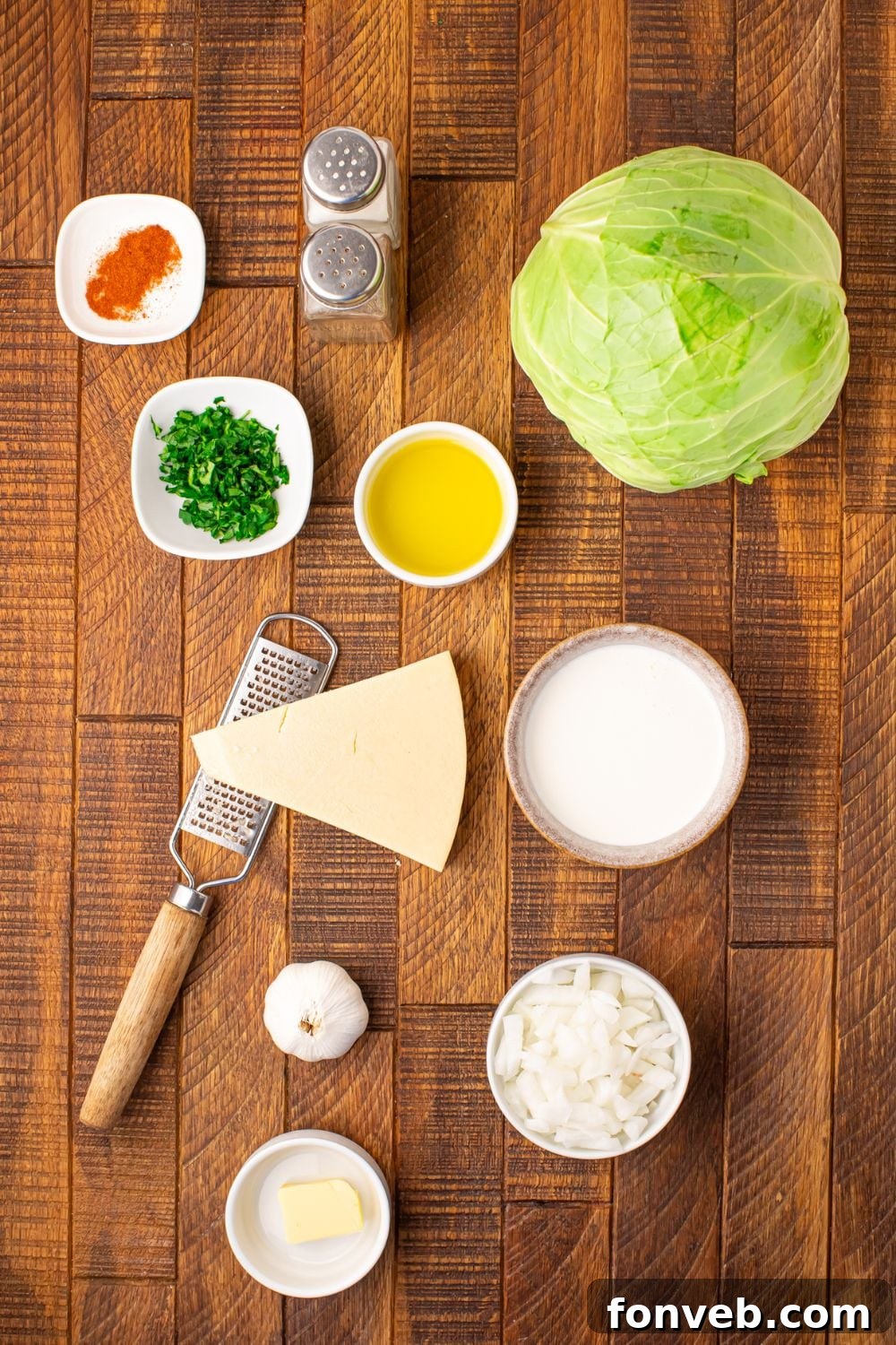 Keto Creamy Garlic Parmesan Cabbage Skillet 7 Ingredients for Creamy Garlic Parmesan Cabbage arranged in individual containers