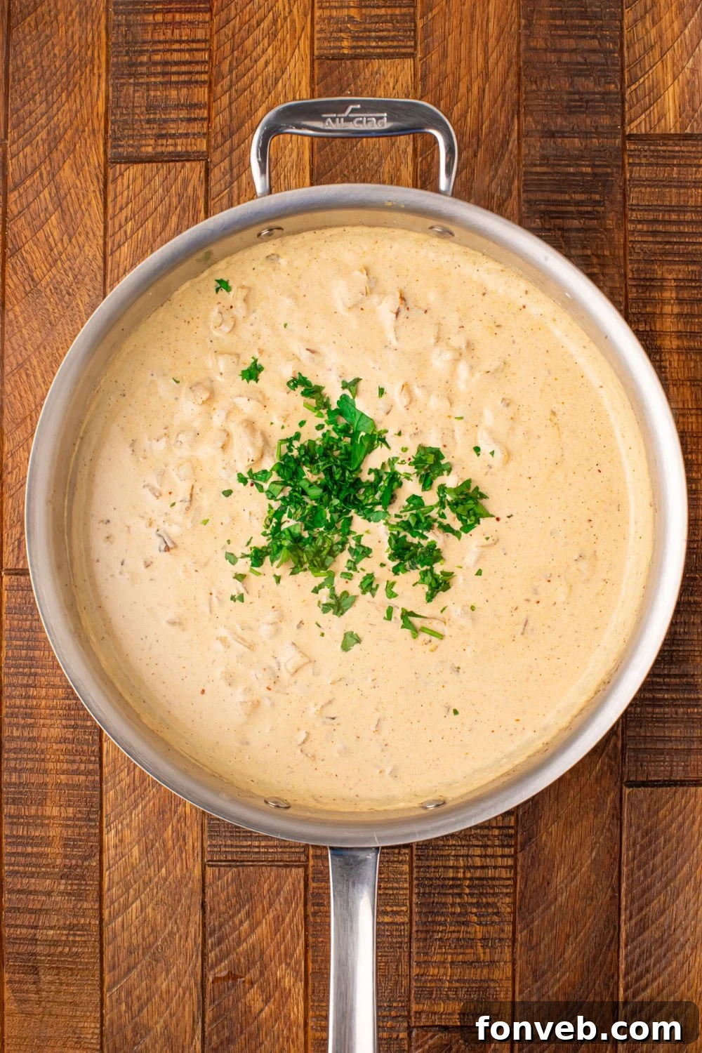 Keto Creamy Garlic Parmesan Cabbage Skillet 10 Creamy garlic parmesan sauce with fresh parsley on top